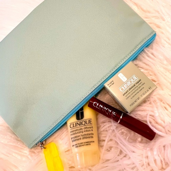 Clinique Other - Clinique ❤️HOST PICK❤️”Cosmetic Bag in Aqua with goodies"